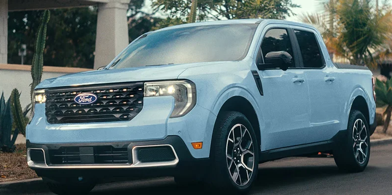 A light blue 2026 Ford Maverick parked on the side of the road.