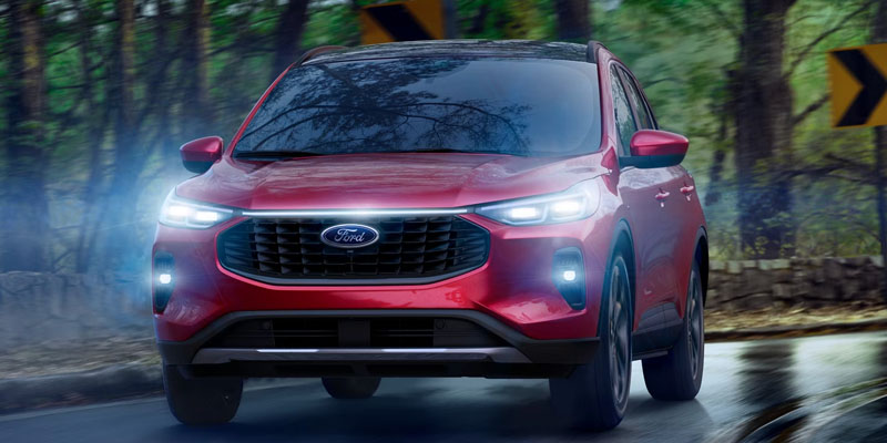 Red 2026 Ford Escape with its stunning look cruising on road