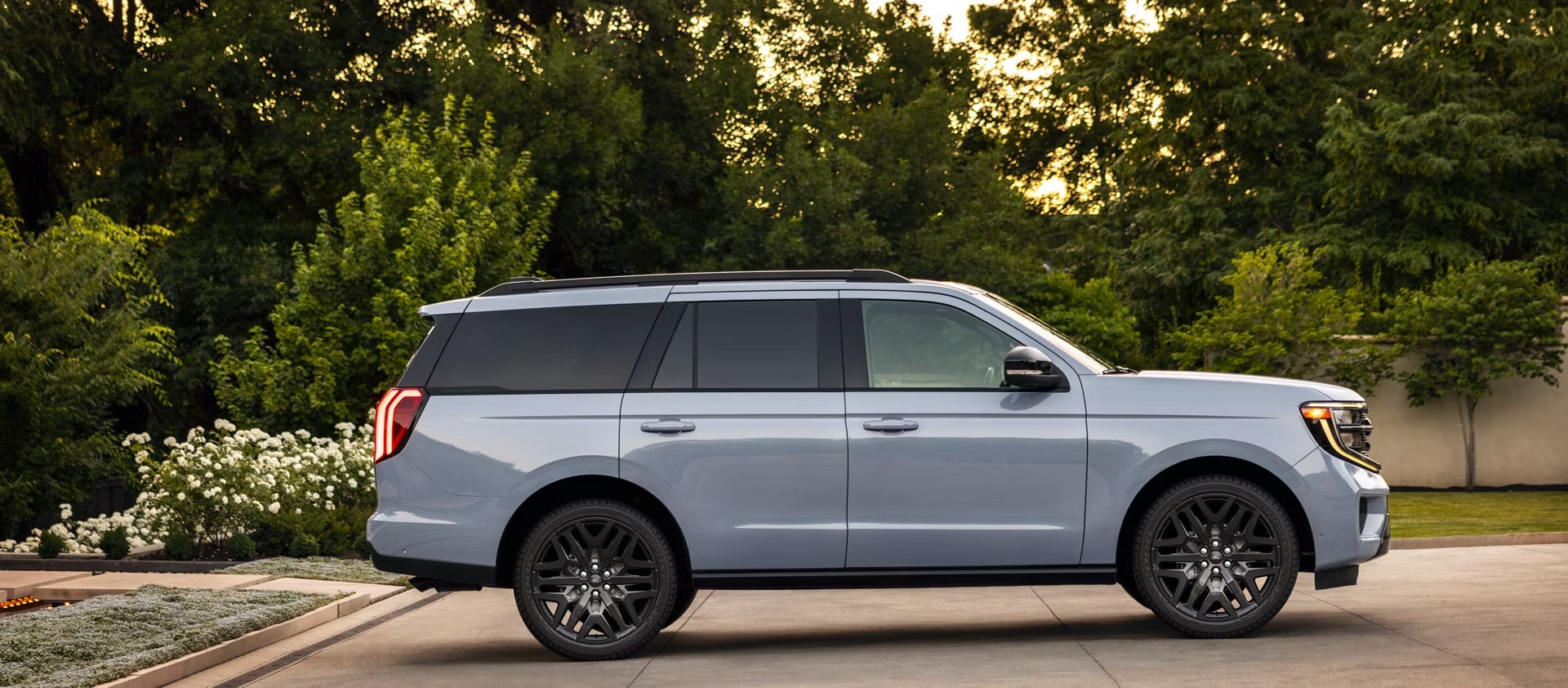 Grey Ford Expedition in a driveway